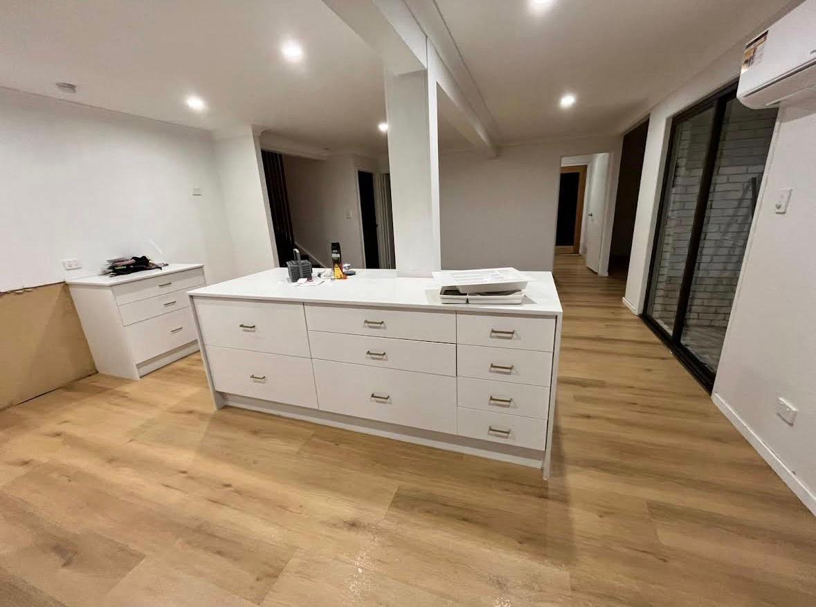 Hygienic office kitchenette and staff amenities maintained during commercial cleaning in Logan